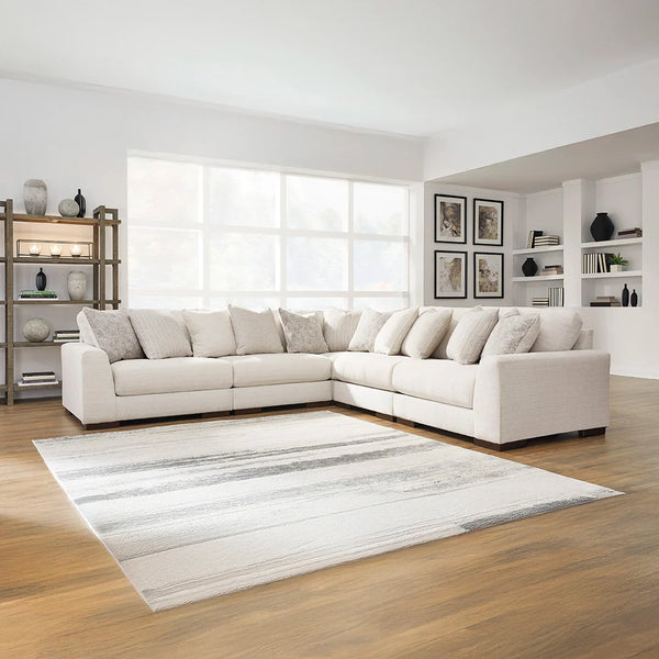 Lyndeboro 4-piece sectional with armless chair, corner chairs, and wedge