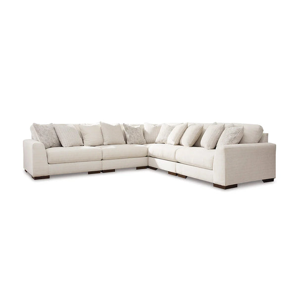Modular sectional with reversible cushions and feather-blend toss pillows