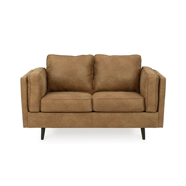 Ashley UAE loveseat featuring sheltering arms and bolster pillows.