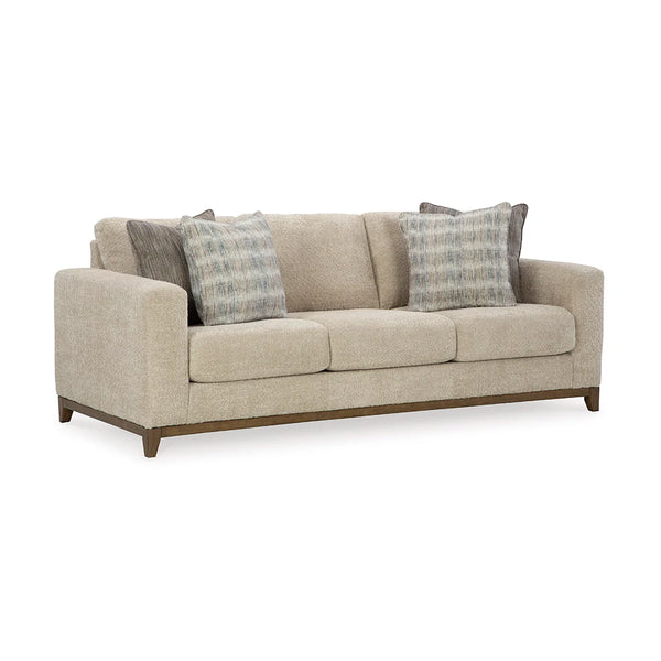 Polyester upholstered sofa with decorative pillows.
