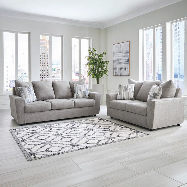 Modern grey corner sofa set with modular design and single sofa.