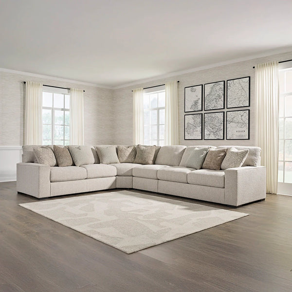 Contemporary sectional with feather-blend cushions and accent pillows