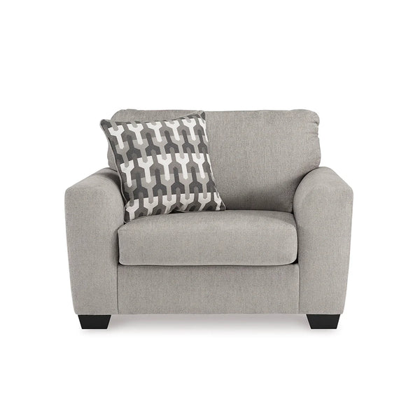 Chair with attached back cushions and loose seat cushions