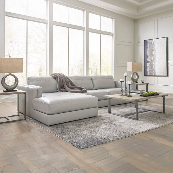 Contemporary leather sectional with sleek double-padded arms and low profile