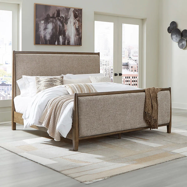 Roanhowe king upholstered bed in brown oak finish with soft fabric headboard – Ashley UAE