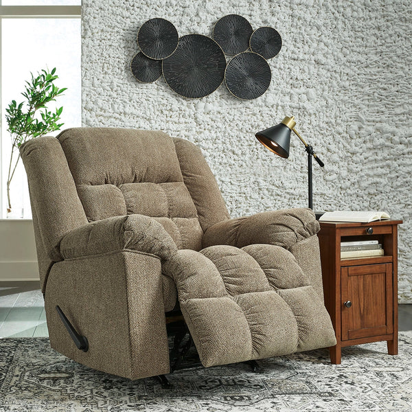 Cozy brown recliner with timeless design, perfect for any home decor ��� Ashley UAE