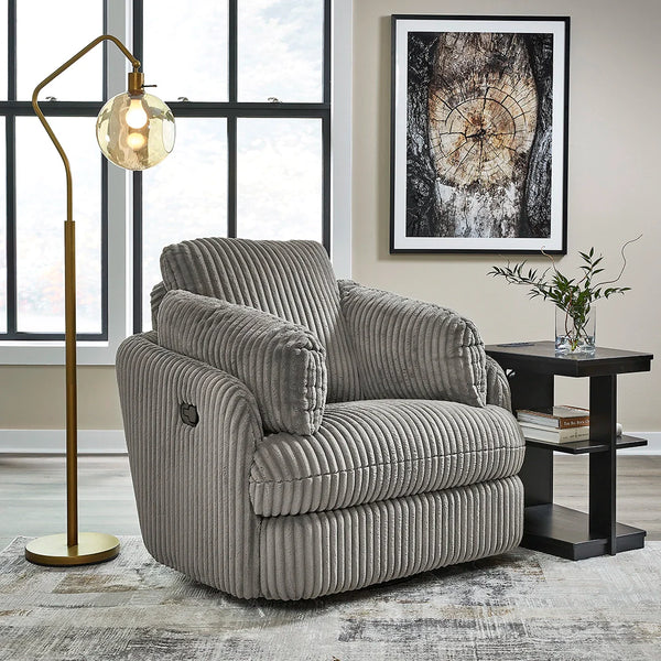 Barrel-shaped recliner with soft cord upholstery, swivel base, and hidden storage ��� Ashley UAE
