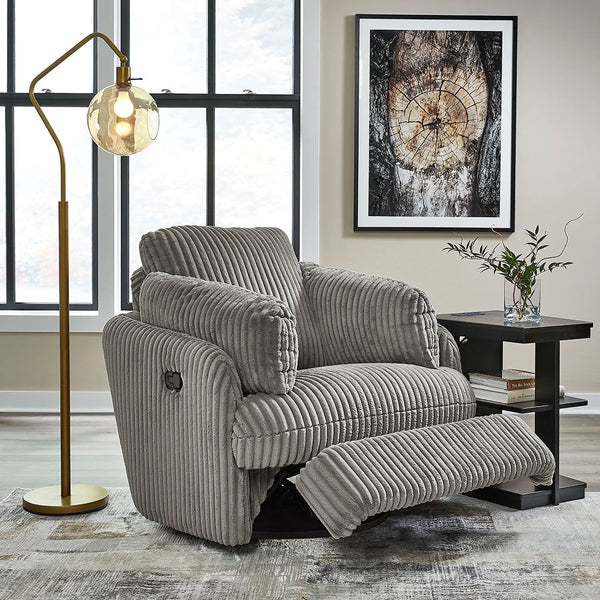 Cozy recliner chair with press-back reclining motion and bolster pillows ��� Ashley UAE