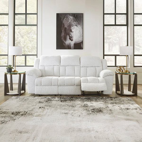 White corner recliner sofa and loveseat featuring plush cushions and style.