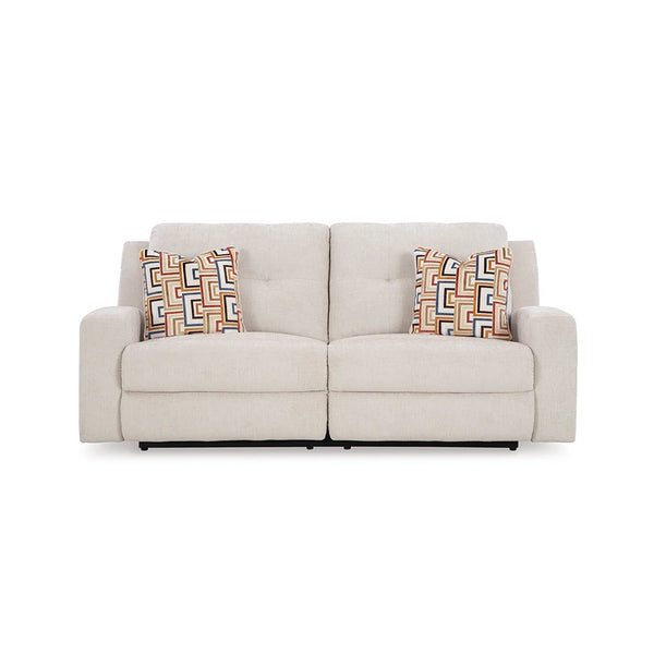 Beige recliner sofa Dubai with pull-tab motion and accent pillows included.