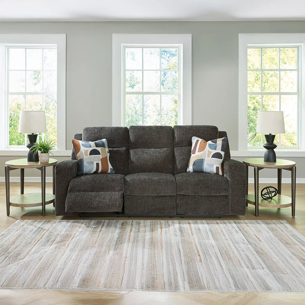 Kanlow reclining sofa Dubai with soft polyester upholstery and accent pillows.