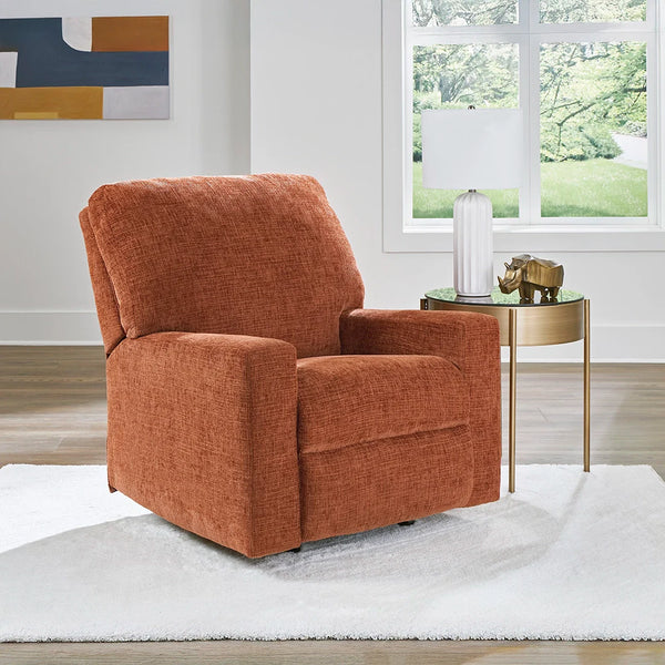 Trendy orange recliner chair with polyester upholstery and gentle rocking motion ��� Ashley UAE