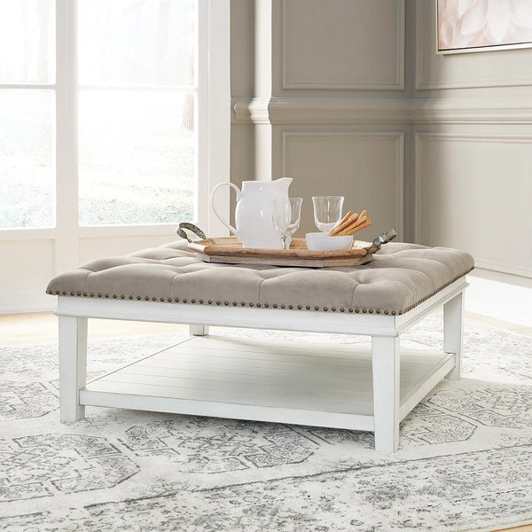 Kanwyn ottoman coffee table with tufted faux leather top ��� Ashley UAE