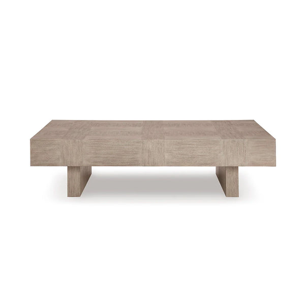 Transitional coffee table crafted with hardwood solids, oak veneer, and MDF in light gray textured finish.