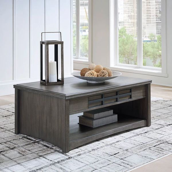 Montillan lift-top coffee table in medium gray-brown finish with blackened wood grain and storage bins.