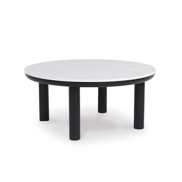 Modern round coffee table with two coordinating end tables.